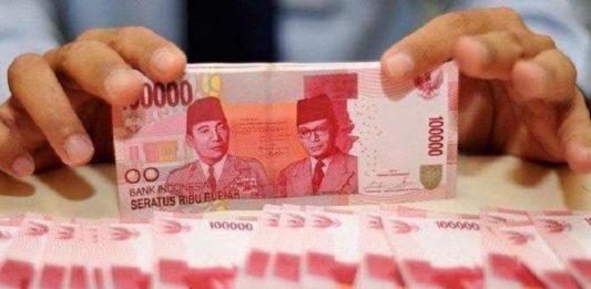 Ilustrasi bantuan sosial (bansos) berwujud uang