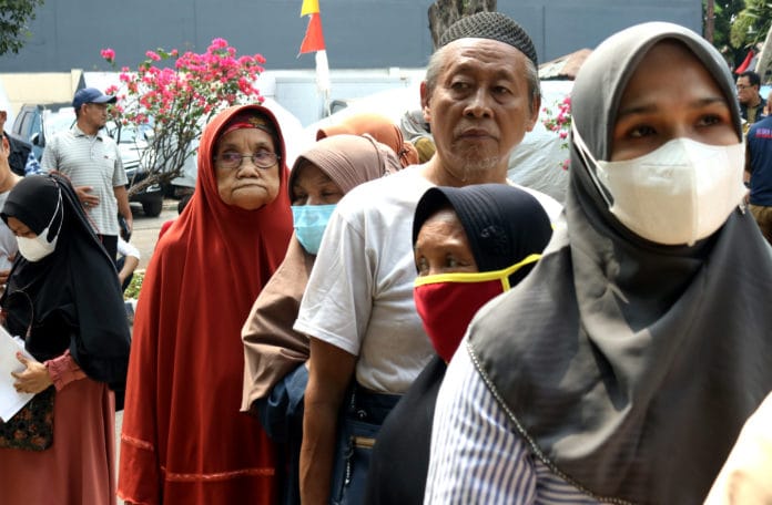 Penyaluran Bansos di DKI